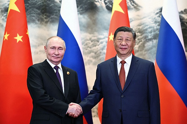Russian President Vladimir Putin (left) with Chinese counterpart Xi Jinping