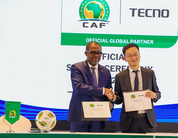 Confederation of African Football (CAF) General Secretary, Véron Mosengo-Omba (left) with Tecno Vice President, Shiming Jiang