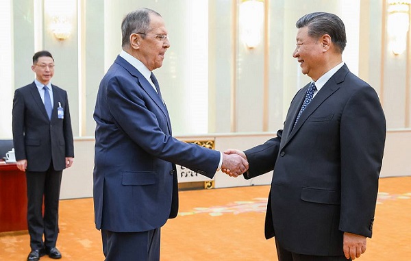 Russian Foreign Minister Sergey Lavrov receives a warm welcome from Chinese President Xi Jinping